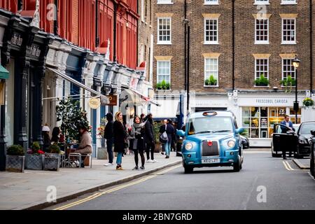 Chiltern Street nel quartiere di Marylebone di West London- un premio di shopping con lussuosi negozi e luoghi della vita notturna Foto Stock