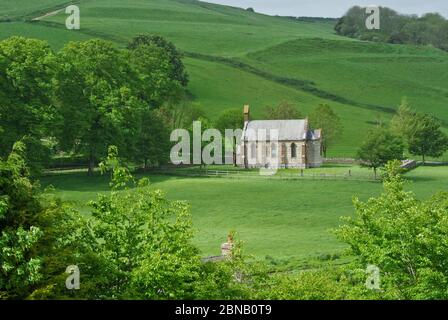 La chiesa isolata di St Laurence nella frazione di Wynford Eagle, Dorset, Regno Unito; origini medievali ma ricostruita nel 19 ° secolo Foto Stock