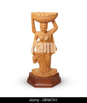 Una piccola statua di legno di signora - showpiece - arredamento domestico - isolato Foto Stock