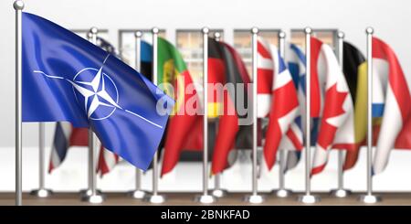 L'organizzazione del trattato Nord Atlantico o il simbolo dell'Alleanza Nord Atlantico sulla scrivania di legno, offuscare i membri della NATO bandiere lo sfondo. illustrazione 3d Foto Stock