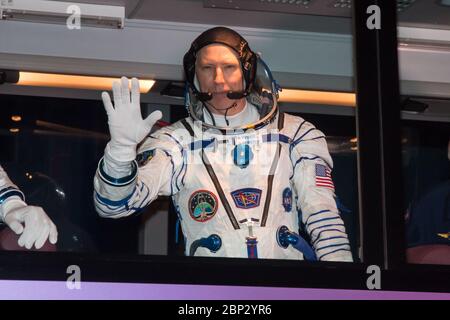 Il 21 marzo 2018, l'astronauta della NASA Drew Feustel, il comandante di Sojuz Oleg Artemyev e l'ingegnere di volo Ricky Arnold partirono per la rampa di lancio al cosmodromo di Baikonur in Kazakistan in preparazione della loro missione di cinque mesi a bordo della stazione spaziale Internazionale. Foto Stock