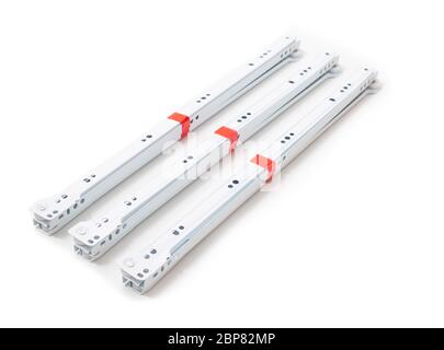 Guide a rulli per l'installazione durante l'assemblaggio di mobili, sfondo, isolamento, assemblaggio Foto Stock