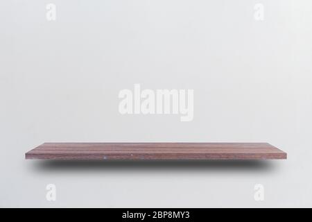 Vista frontale ripiano vuoto in legno e parete grigia. Concetto di design Foto Stock