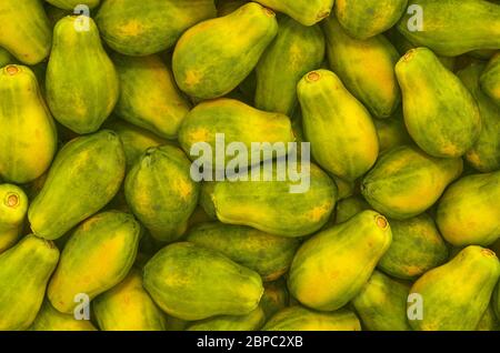 Sfondo da papaya, vista dall'alto. Rendering 3D Foto Stock