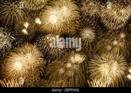 Capodanno fuochi d'artificio gold sfondo dorato anni anno sfondi fuochi d'artificio Foto Stock