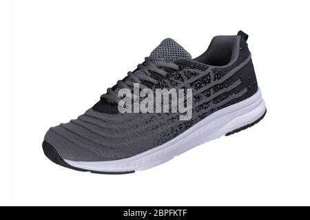 Scarpe sportive. Sneaker grigie in tessuto con dettagli neri. Foto Stock