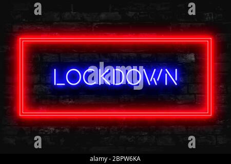 Lockdown Neon segno su uno sfondo di mattoni scuri Foto Stock