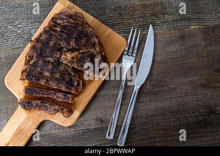 Bistecca di costolette nere angus alla griglia Foto Stock