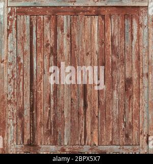 Primo piano di una vecchia porta di fienile di legno. Foto Stock