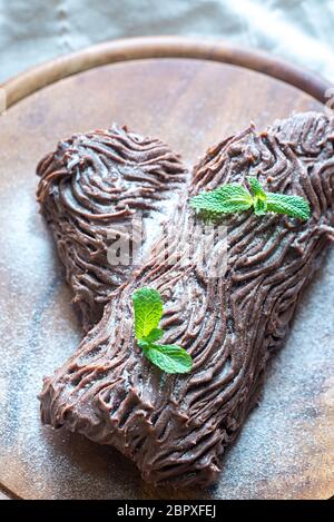 Yule log sul pannello di legno Foto Stock