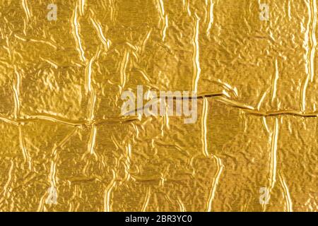 Shiny yellow leaf di lamina di oro sfondo texture Foto Stock