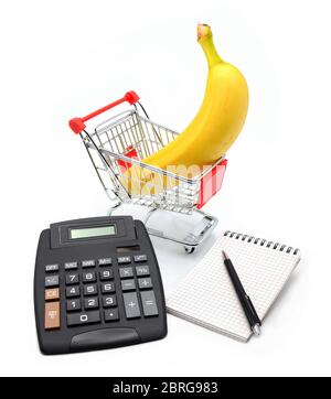 Carrello con calcolatrice e libro di note cartaceo Foto Stock