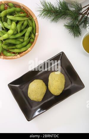 Torte di riso con si è schiantato dolce salsa di soia Foto Stock