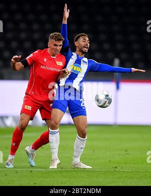 22 maggio 2020, Berlino: BERLINO, GERMANIA - MAGGIO 22: Matheus Santos Carneiro da Cunha (R) di Hertha Berlin sfida Grischa Proemel di Union Berlin durante la partita di Bundesliga tra Hertha BSC e 1. FC Union Berlin all'Olympiastadion il 22 maggio 2020 a Berlino, Germania. La Bundesliga e la seconda Bundesliga è la prima lega professionale a riprendere la stagione dopo il blocco nazionale a causa della pandemia in corso di Coronavirus (COVID-19). Tutte le partite fino alla fine della stagione saranno giocate a porte chiuse. (Foto di Stuart Franklin/Getty Images) Foto: Stuart Franklin/Getty Images Europe Foto Stock