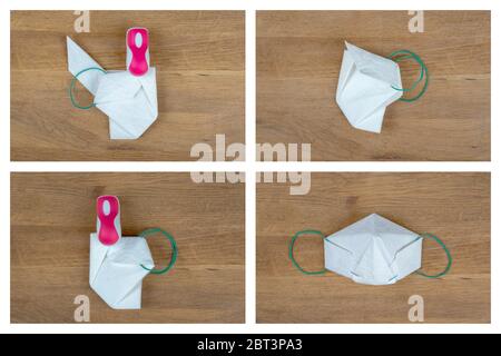 Fasi di piegatura di una maschera facciale di carta da un asciugamano di carta. Parte 5/5. Foto Stock