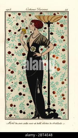 Donna in abito da sera di raso nero e tulle, bordato con brillant. Robe de soir satin noir et tulle, bordee de brillants. Incisione di un pochoir colorato a mano (stencil) dopo un'illustrazione di George Barbier da Tommaso Antonginis Journal des Dames et des Modes, Aux Bureaux du Journal des Dames, Parigi, 1912. Foto Stock