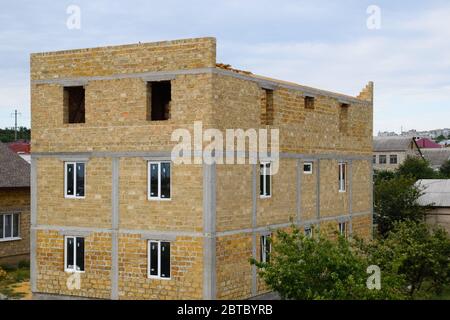 Case calcaree. Il materiale da costruzione è calcare. Foto Stock