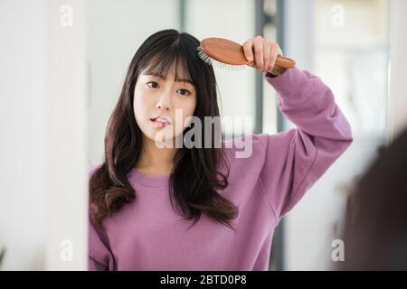 Concetto di vita quotidiana di giovane donna asiatica. Godendo di routine quotidiana 244 Foto Stock