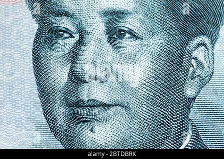 Ritratto di Mao Zedong su dieci yuan cinesi. Valuta cinese su macro. Foto Stock