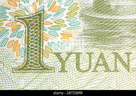 Angolo di una banconota cinese Yuan. Valuta cinese su macro. Foto Stock