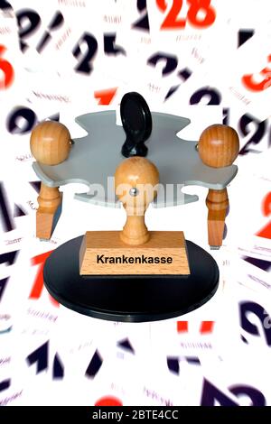 Timbro scritta Krankenkasse, assicurazione sanitaria su fogli calendario, composizione Foto Stock