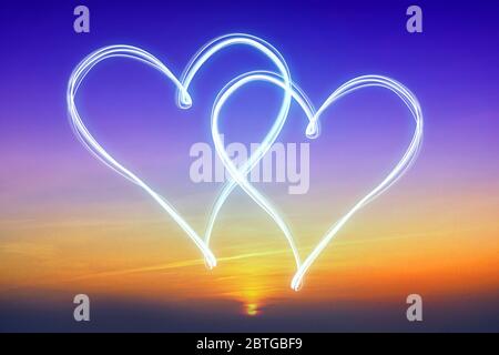 Due cuori - concetto di amore Foto Stock