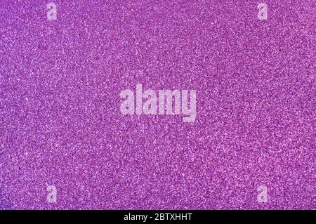 Colorato astratto sfocato sfondo viola chiaro, glitter texture natalizia Foto Stock