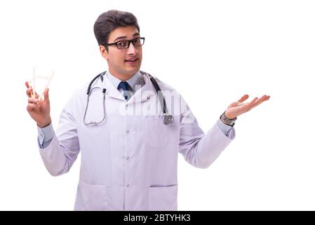 Il giovane maschio medico con calibri isolato su bianco Foto Stock