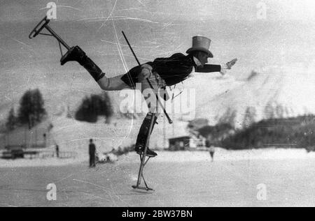 Acrobazie su palafitte a St Moritz . La Svizzera di St Moritz è ora affollata di visitatori e gli sport invernali sono in pieno svolgimento . Phil Taylor che esegue acrobazie sul ghiaccio a St Moritz . 30 dicembre 1933 Foto Stock