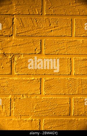golden ombra sfondo di mattoni a trama Foto Stock