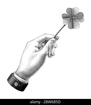 Mano tenere trifoglio foglia disegno vintage stile nero e bianco clipart isolato su sfondo bianco Illustrazione Vettoriale