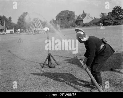 Torneo di vigili del fuoco di Erith e District . Trapano per tubo antincendio . 1937 Foto Stock