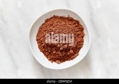 Cacao in polvere in un recipiente Foto Stock