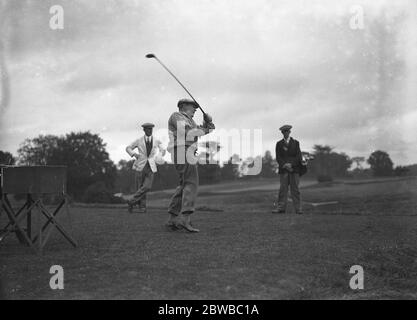 Golf giocatori di tennis prato al Woodcote Park MR L J Chilingworth Foto Stock