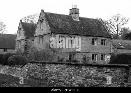 Casa inglese storia di vecchio stile edificio di tipo storico muro casale in pietra all'aperto gente fuori dalla vita grandi tipi di tipo vista la storia Foto Stock