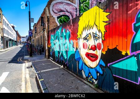 Murale di Boris Johnson come clown di ante ltd in Fashion Street, Spitalfields, Londra, UK Foto Stock