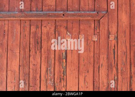 Frammento di un vecchio muro di legno dipinto. Sfondo, texture, tavole Foto Stock