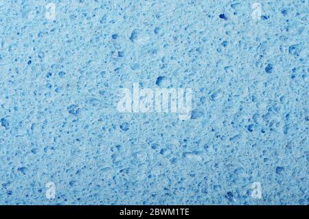 Spugna facciale ovale in cellulosa blu tessuto di fondo Foto Stock