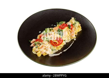 Pasta di fettuccine con salsa al salmone e alla crema. Foto Stock