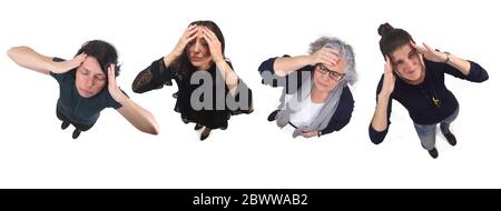 gruppo di donne con mal di testa su bianco Foto Stock