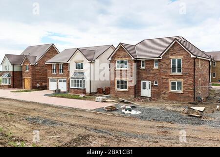 Stewart Milne cantiere, con case in costruzione, Troon, Ayrshire, Regno Unito Foto Stock
