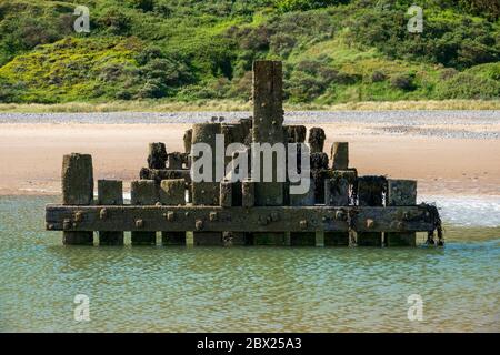 Difesa del mare, groyne, sulla spiaggia di Cromer. Foto Stock