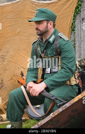 Mid Hants Railway 'War on the Line' 2019 (D-Day 75) con gli Enactor vestiti in costume d'epoca alle stazioni di Alresford, Rotley e Medstead & Four Marks. Foto Stock