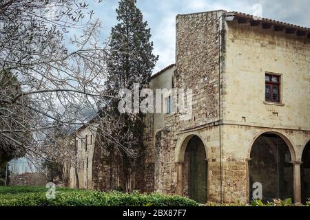 Ingresso al Monastero romanico della SX a Sant Cugat del Vallés - provincia di Barcellona, Catalogna, Spagna Foto Stock