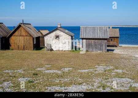 Helgumannens villaggio di pescatori sull'isola di Fåro nel Mar Baltico.Fårö e Gotland sono le principali destinazioni di viaggio in svezia. Foto Stock