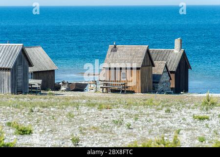 Helgumannens villaggio di pescatori sull'isola di Fåro nel Mar Baltico.Fårö e Gotland sono le principali destinazioni di viaggio in svezia. Foto Stock