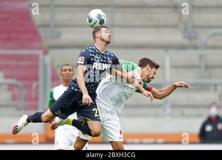 Augusta, Germania. Primo Augusta, Germania, 7 giugno 2020, Rani KHEDIRA, FCA 8 contro Mark UTH, 1.FCK 23 header FC AUGSBURG - 1.FC KOELN Koln, 07.06.2020 1.Bundesliga, stagione 2019/2020, 30.matchday, Koln Peter Schatz/Pool/primo | Use Worldwide Credit: dpa/Alamy Live News 2020 Foto Stock