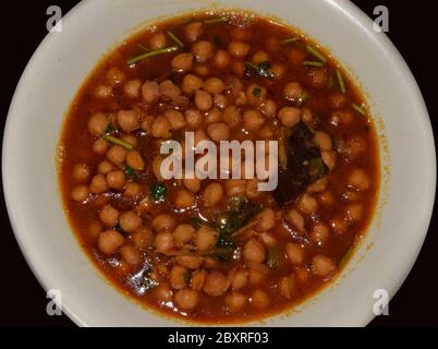 Cucina tradizionale indiana Chole o Masala con sugo di ceci. Piatto del Punjabi Foto Stock