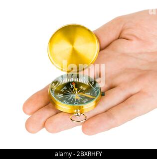 Hand and compass Foto Stock