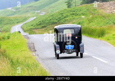 MOFFAT, SCOZIA - 29 GIUGNO 2019: Austin sette auto in un rally auto classico in rotta verso la città di Moffat, Dumfries e Galloway Foto Stock